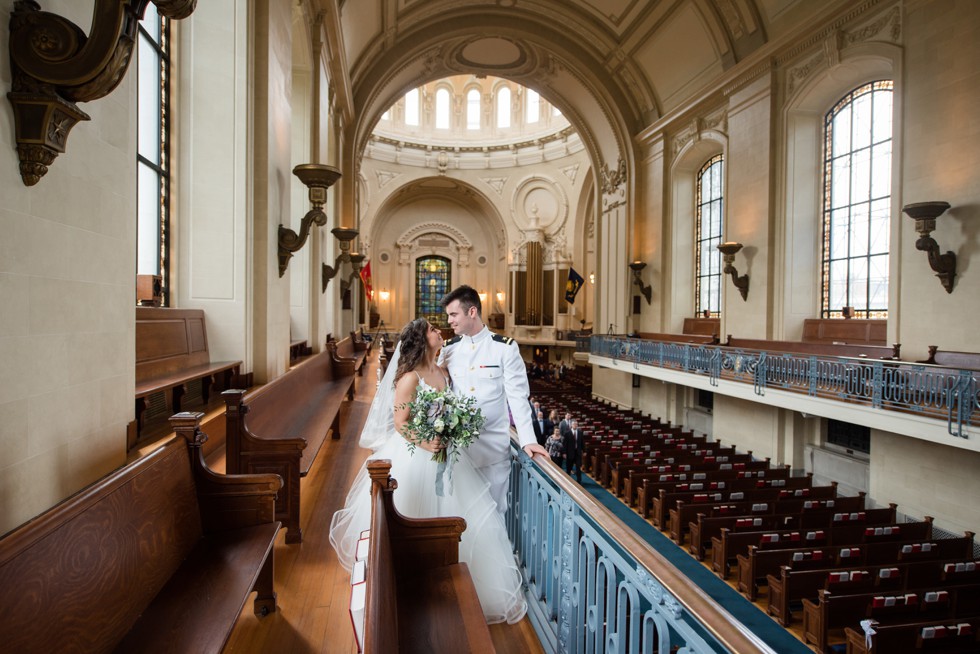 bride and groom overlooking USNA Chapel