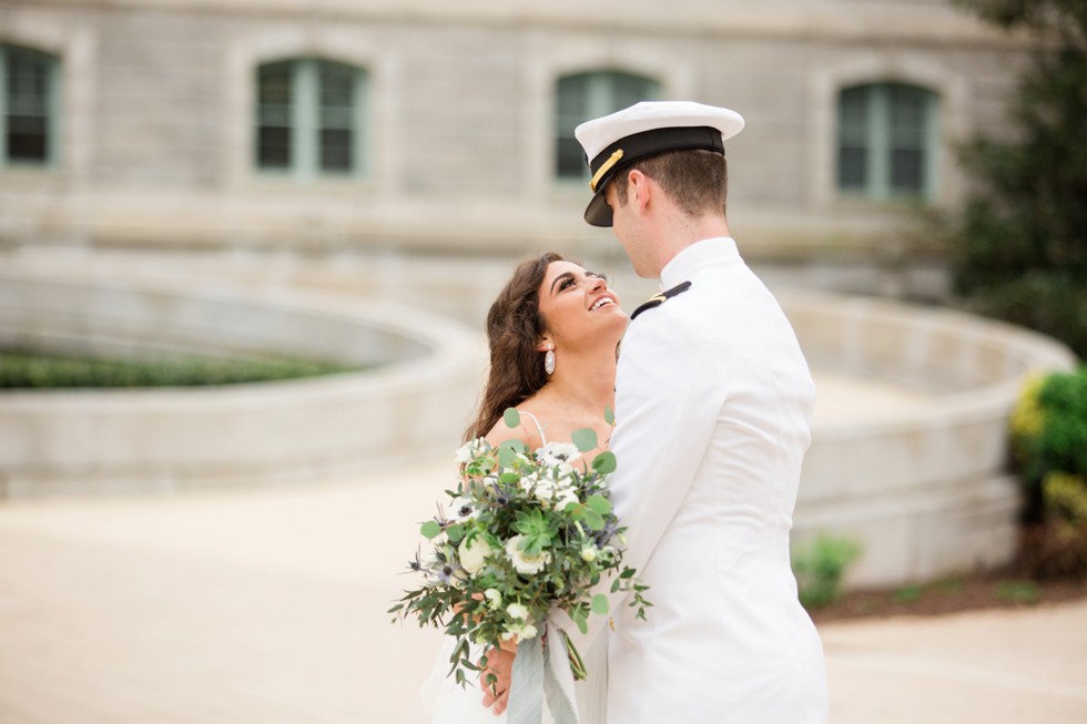 Bride and groom kissing on Buchanan walk way