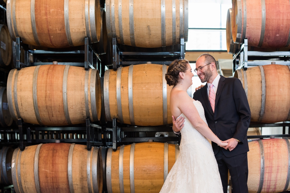 District Winery barrel room bride and groom