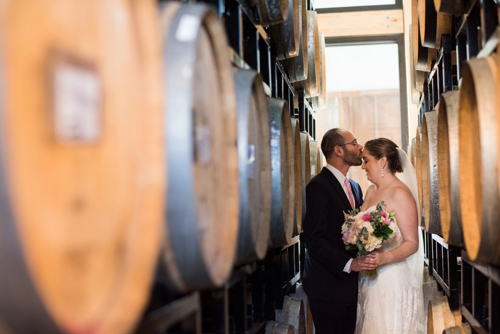 District Winery barrel room bride and groom