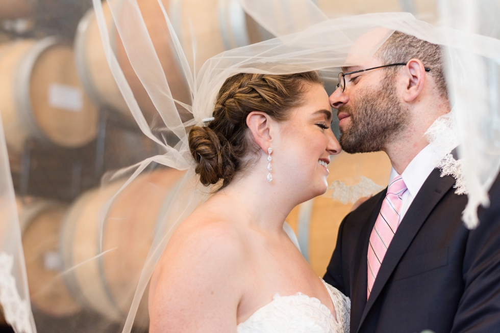 District Winery barrel room bride and groom