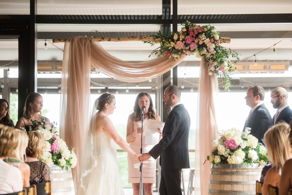 District Winery indoor ceremony J Morris Flowers chuppah