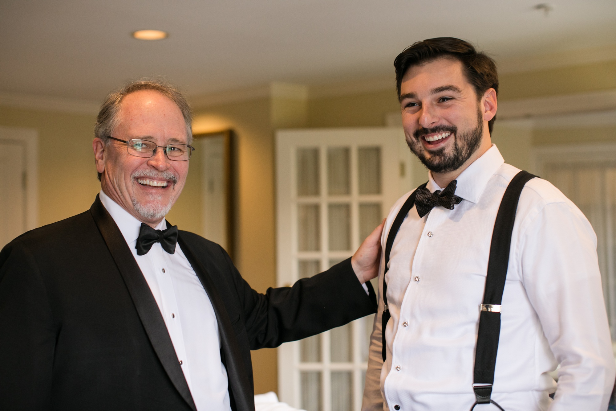 father son groom candid