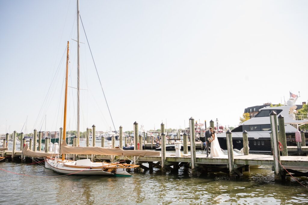 Downtown City Dock Annapolis wedding couple photo with boat