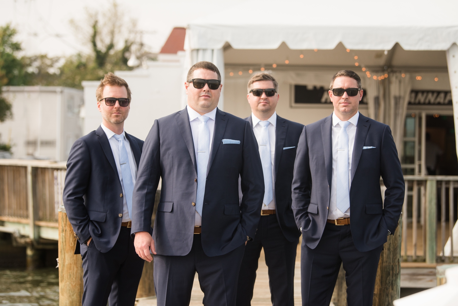 Groom and groomsmen on a dock