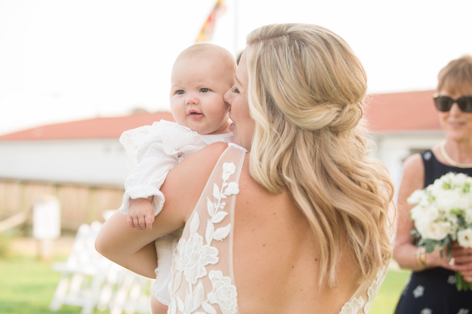 newborn and her mom at the wedding