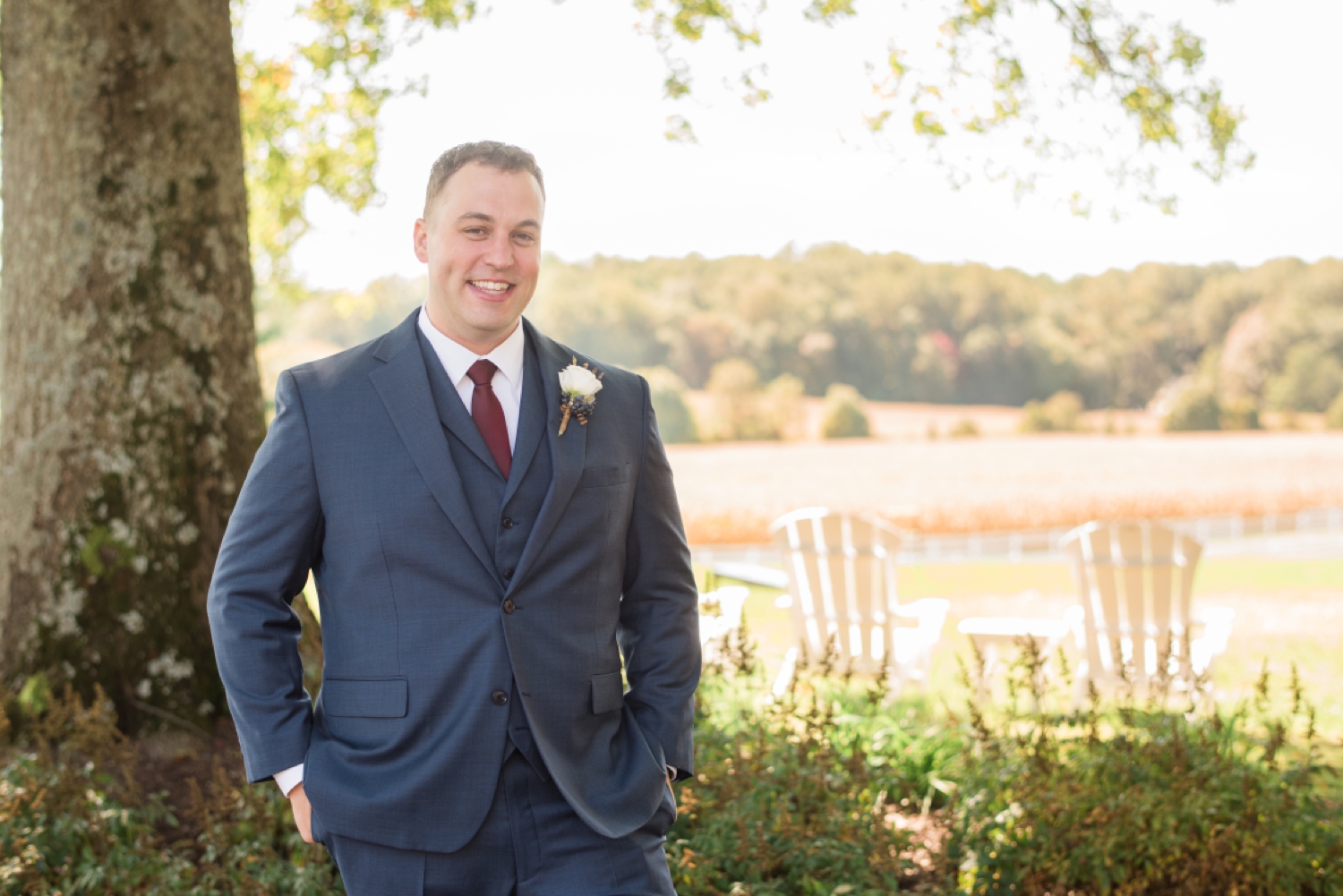 groom in grey navy suit