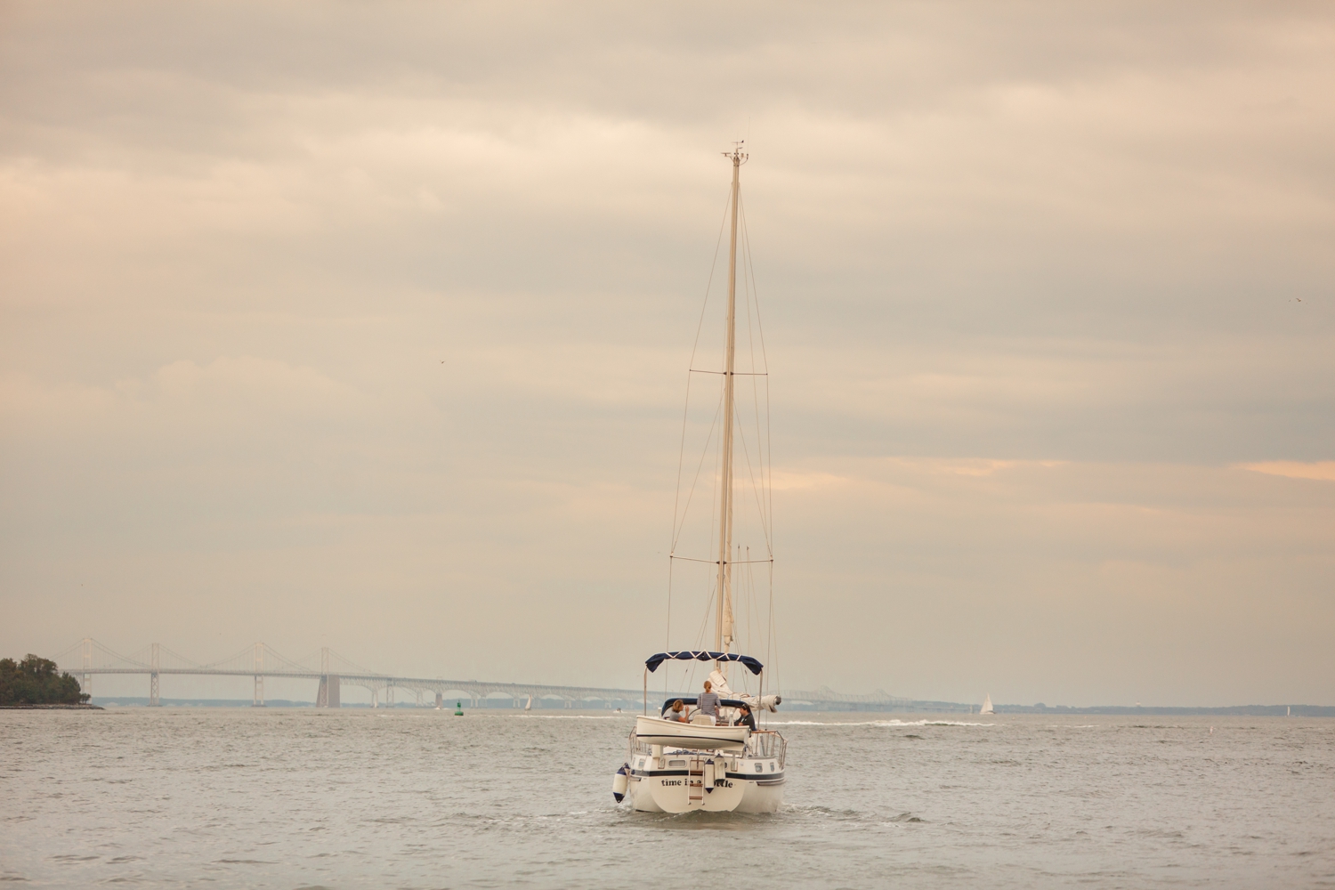 Couple sails off elopement photographs