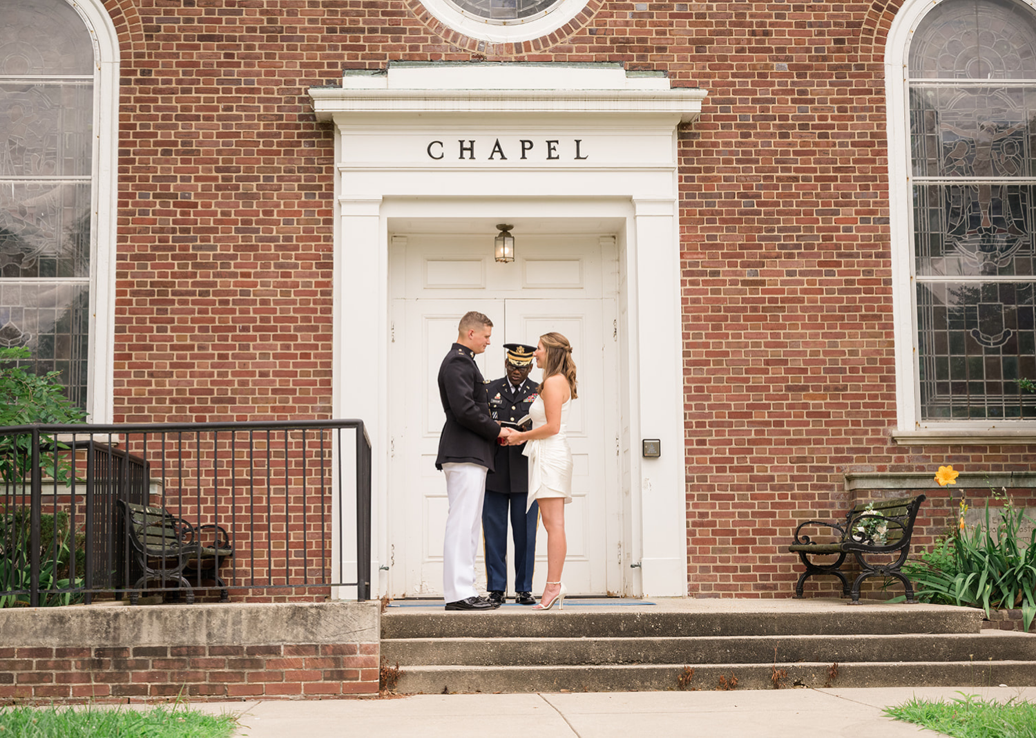 bride and groom smile as they look at each other 