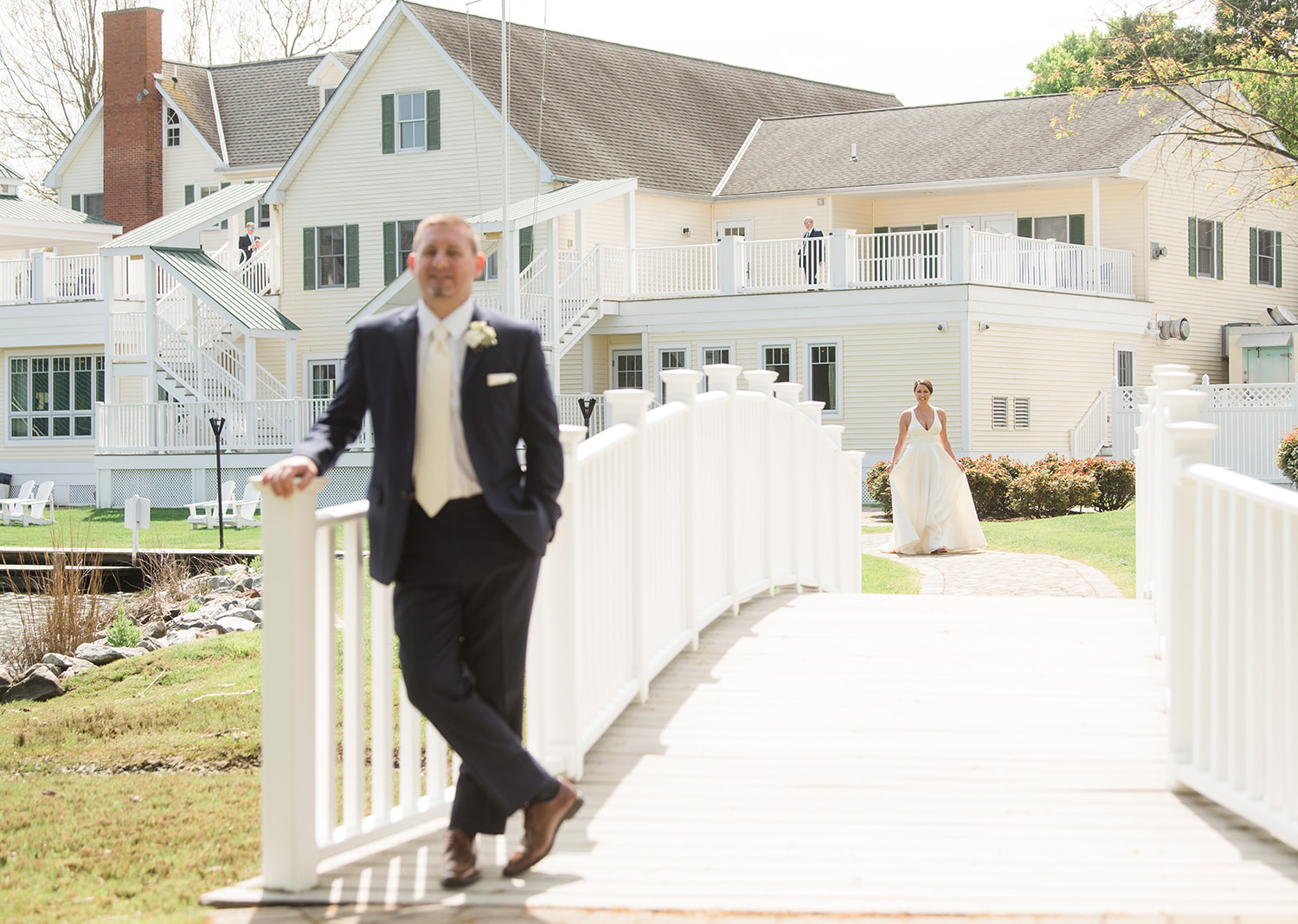 groom smiles as he waits for his bride to come for their first look