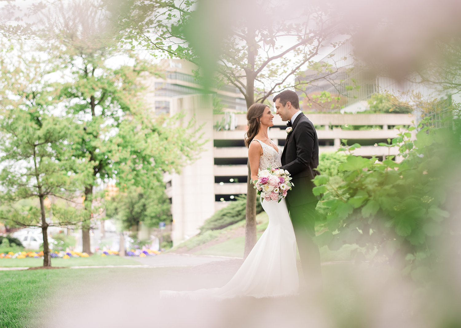 bride and groom romantically look at each other