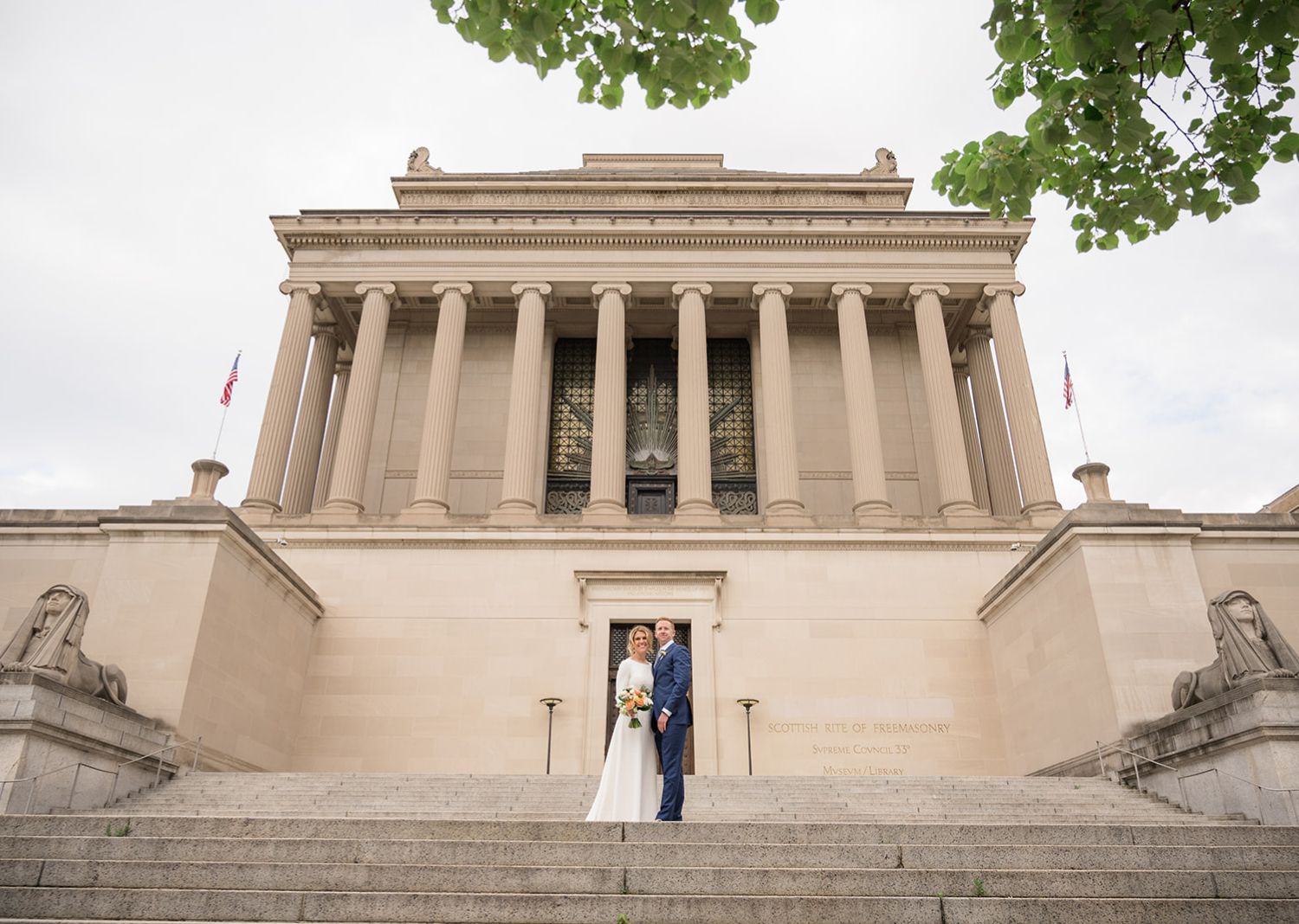 bride and groom take a stroll in the national mall in Washington D.C