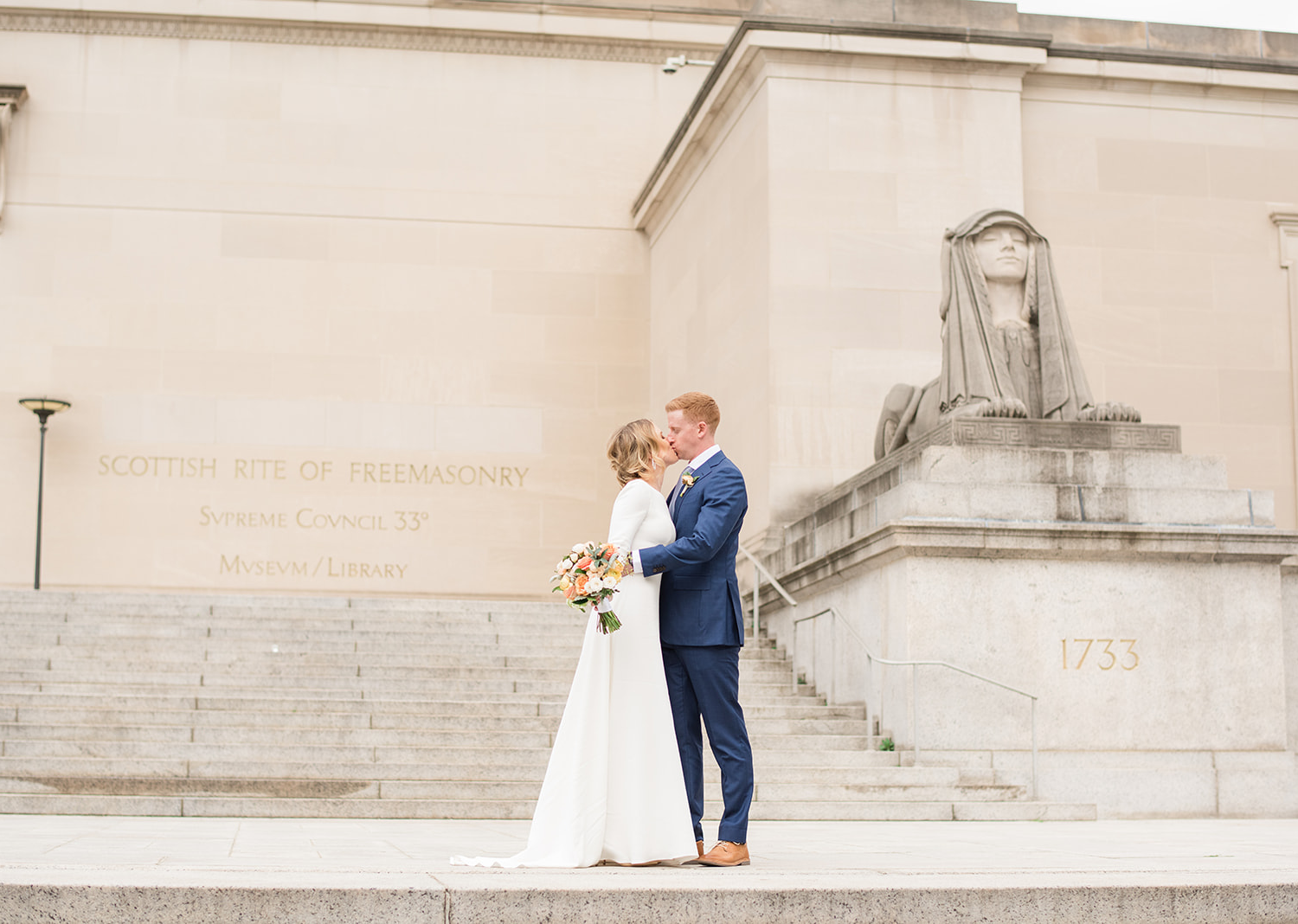 bride and groom take a stroll in the national mall in Washington D.C