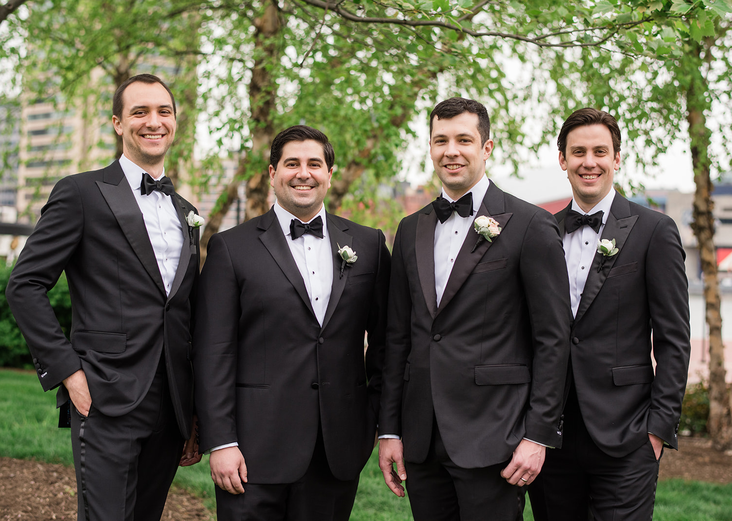 groom standing with his groomsmen