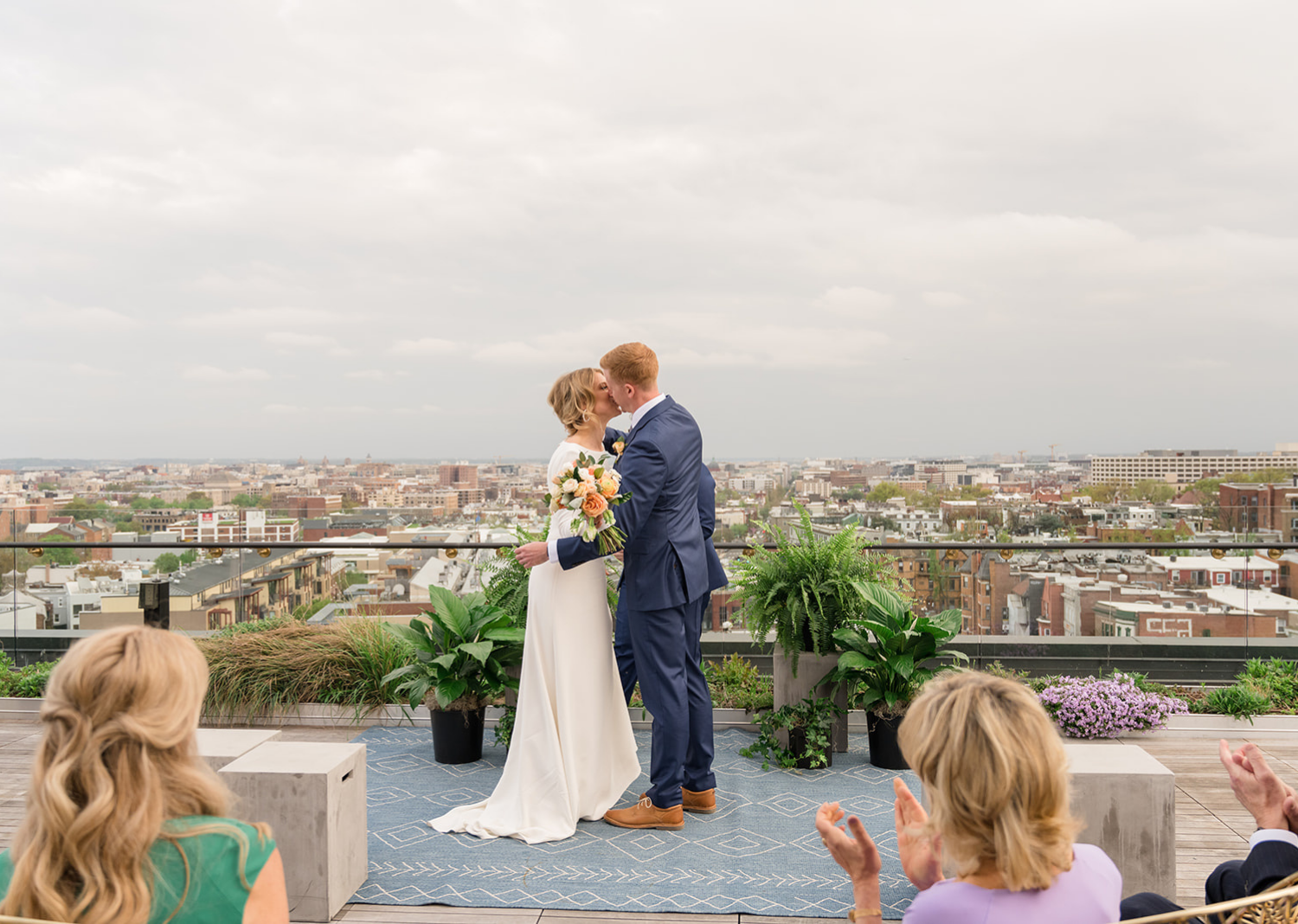 bride and groom share a kiss as husband and wife