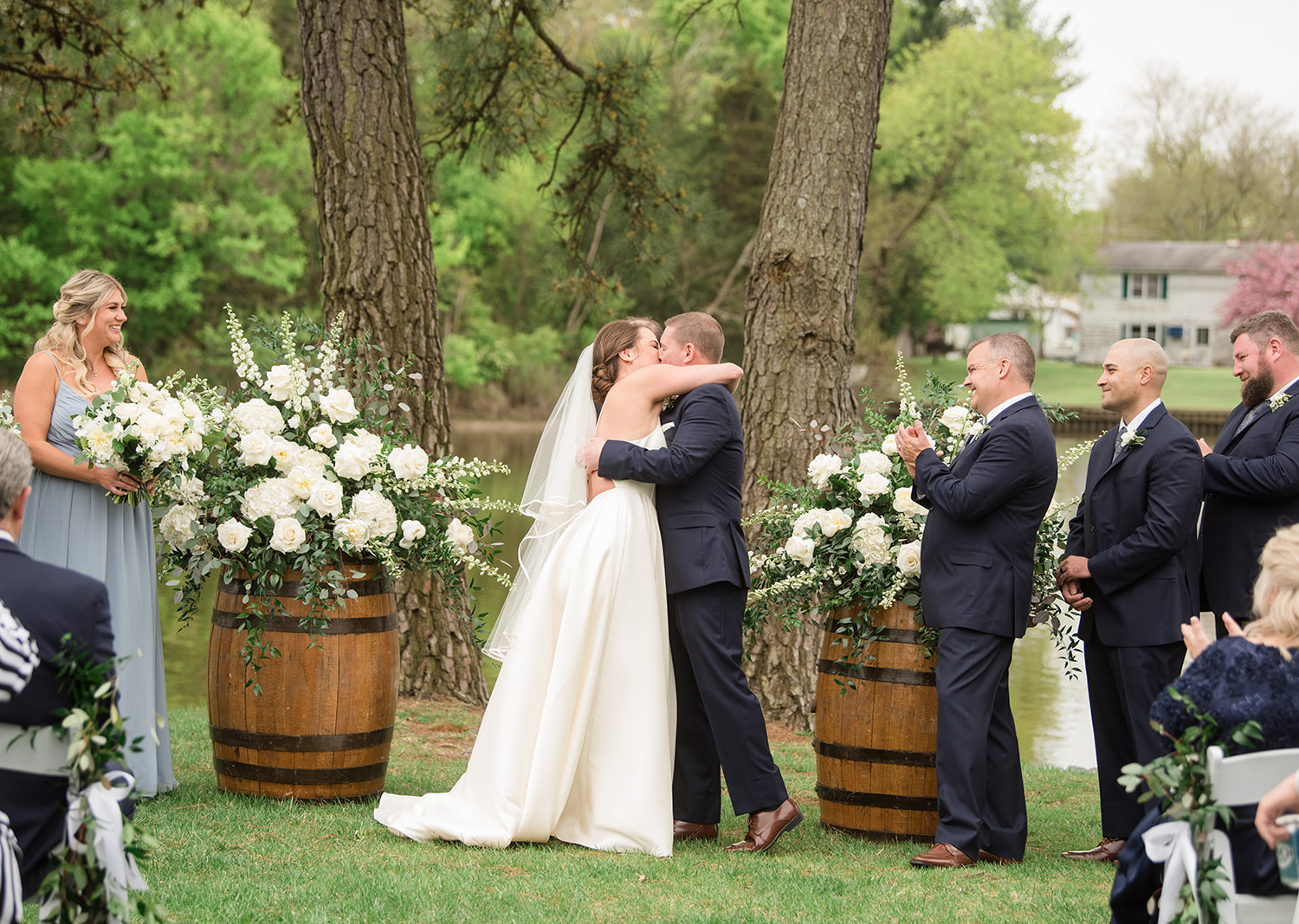 bride and groom share a kiss as husband and wife