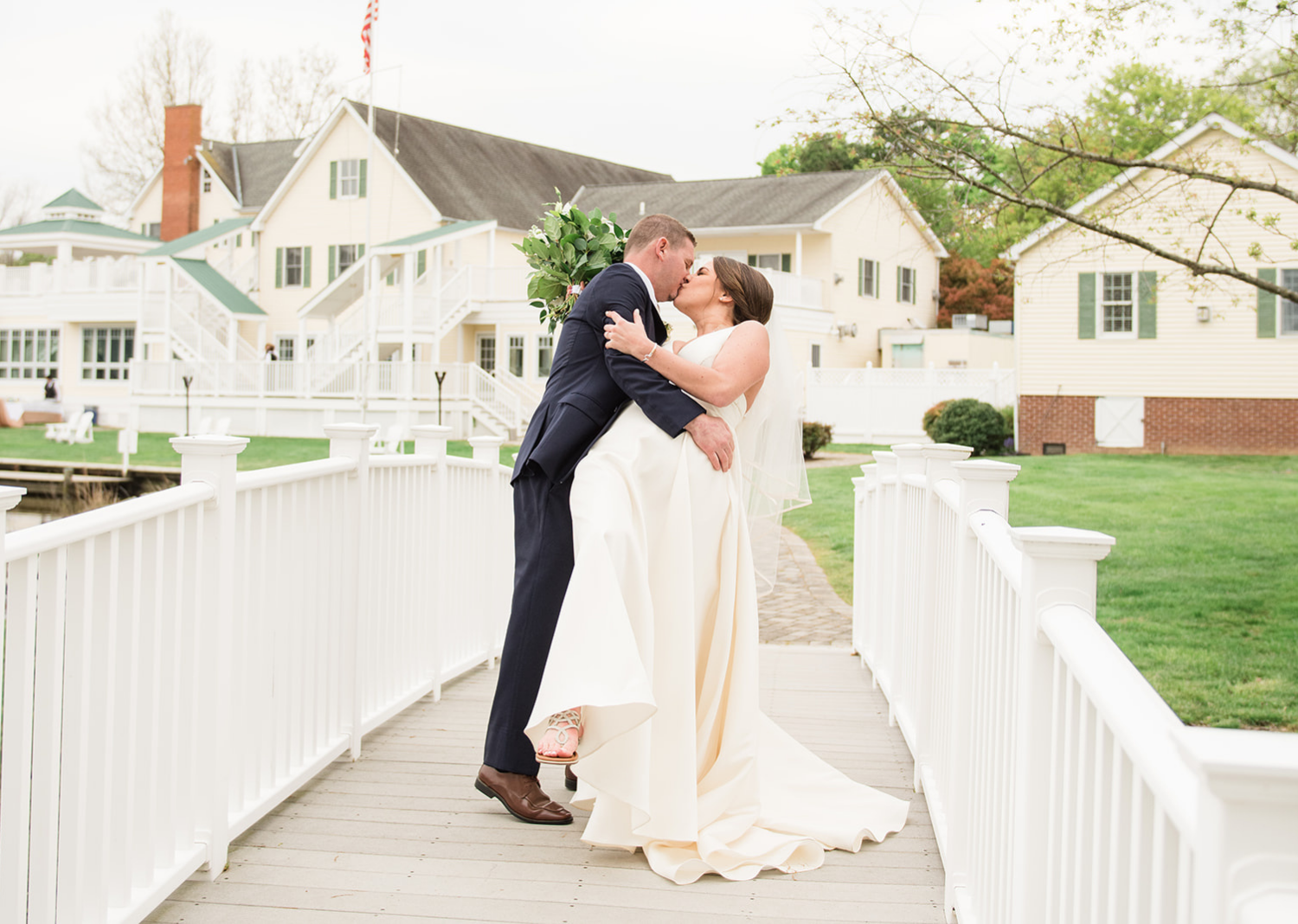 bride and groom share a kiss after their wedding ceremony