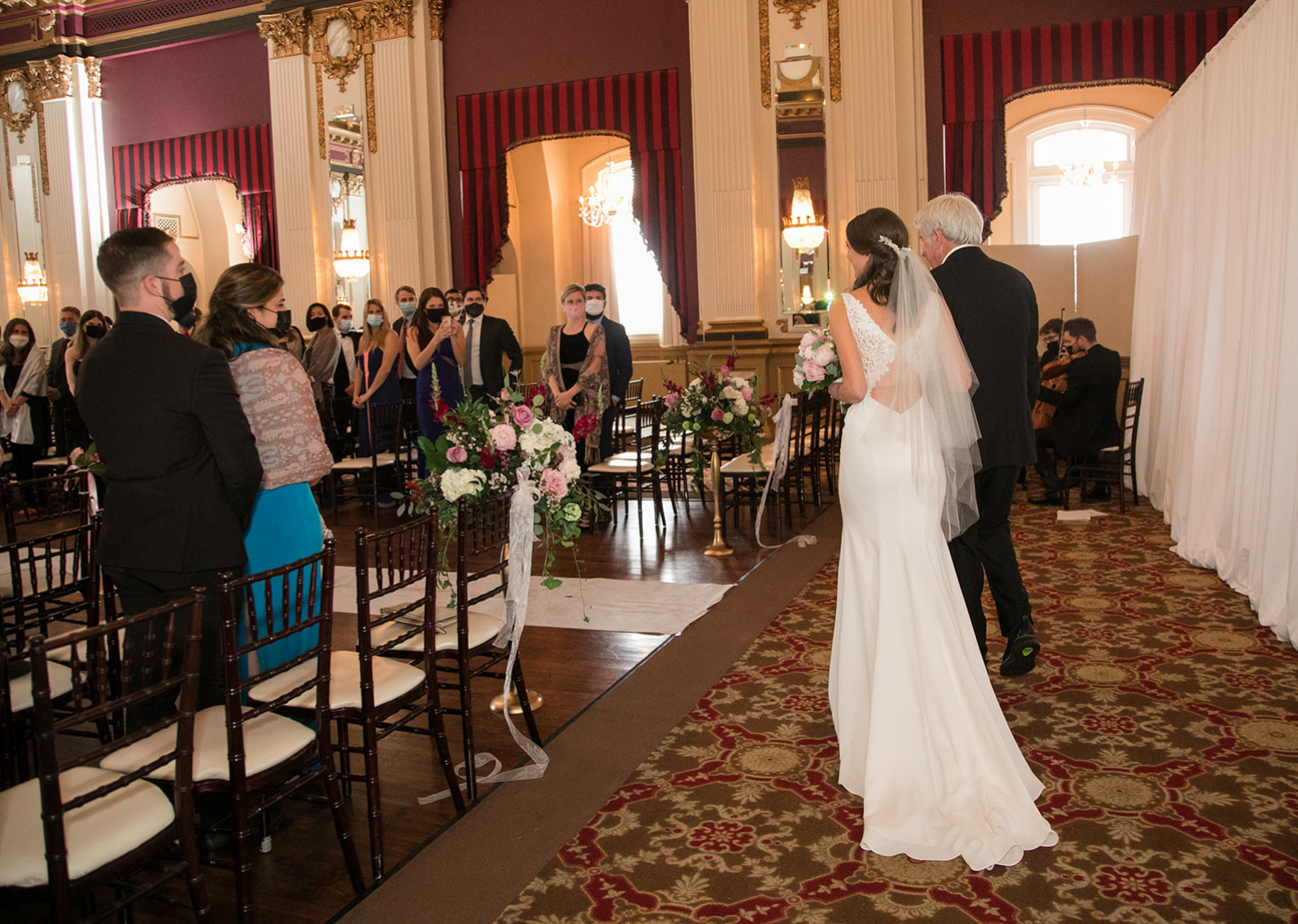 father of the bride walking his daughter down the aisle