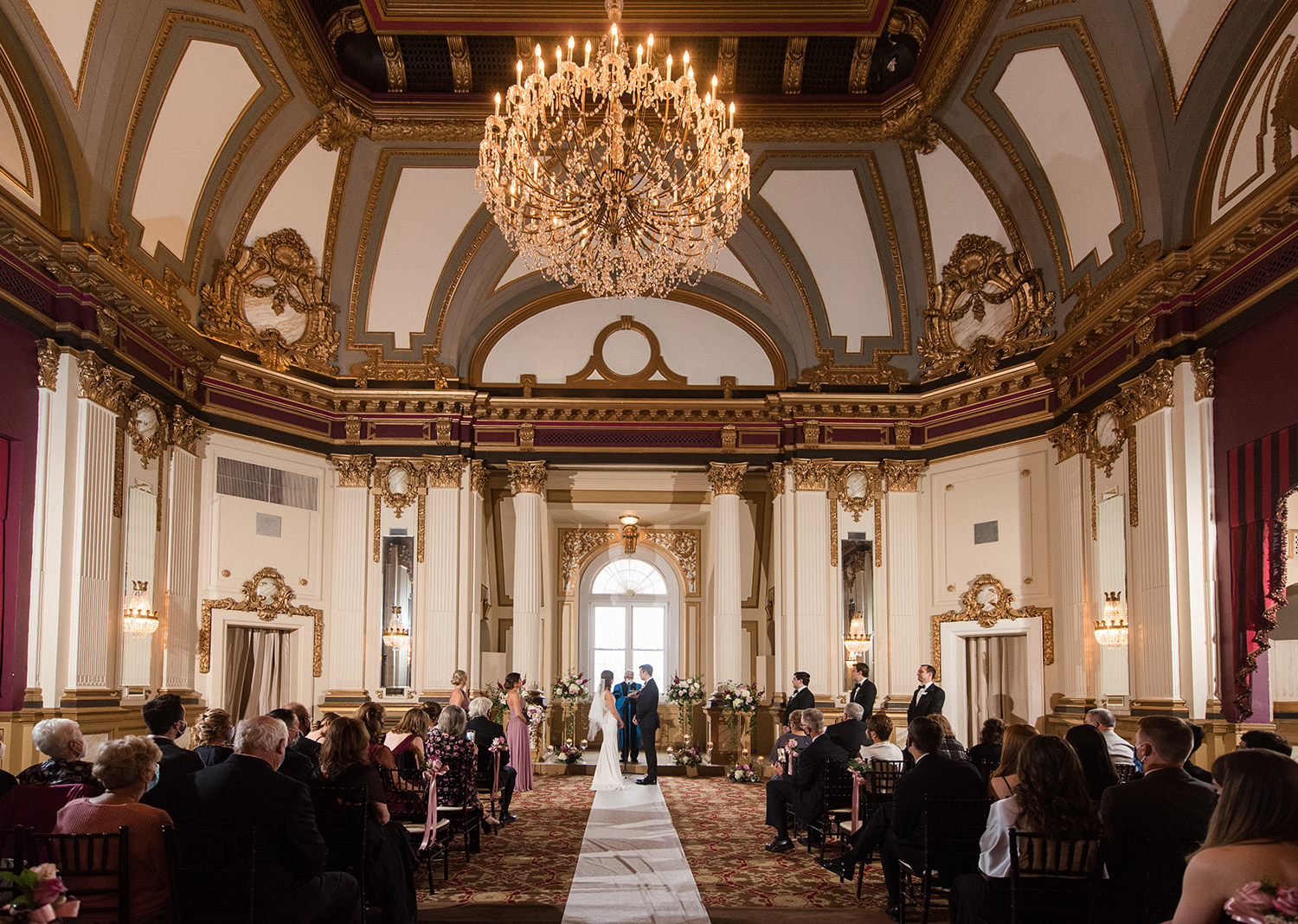 bride and groom during their wedding ceremony at the Belvedere Hotel