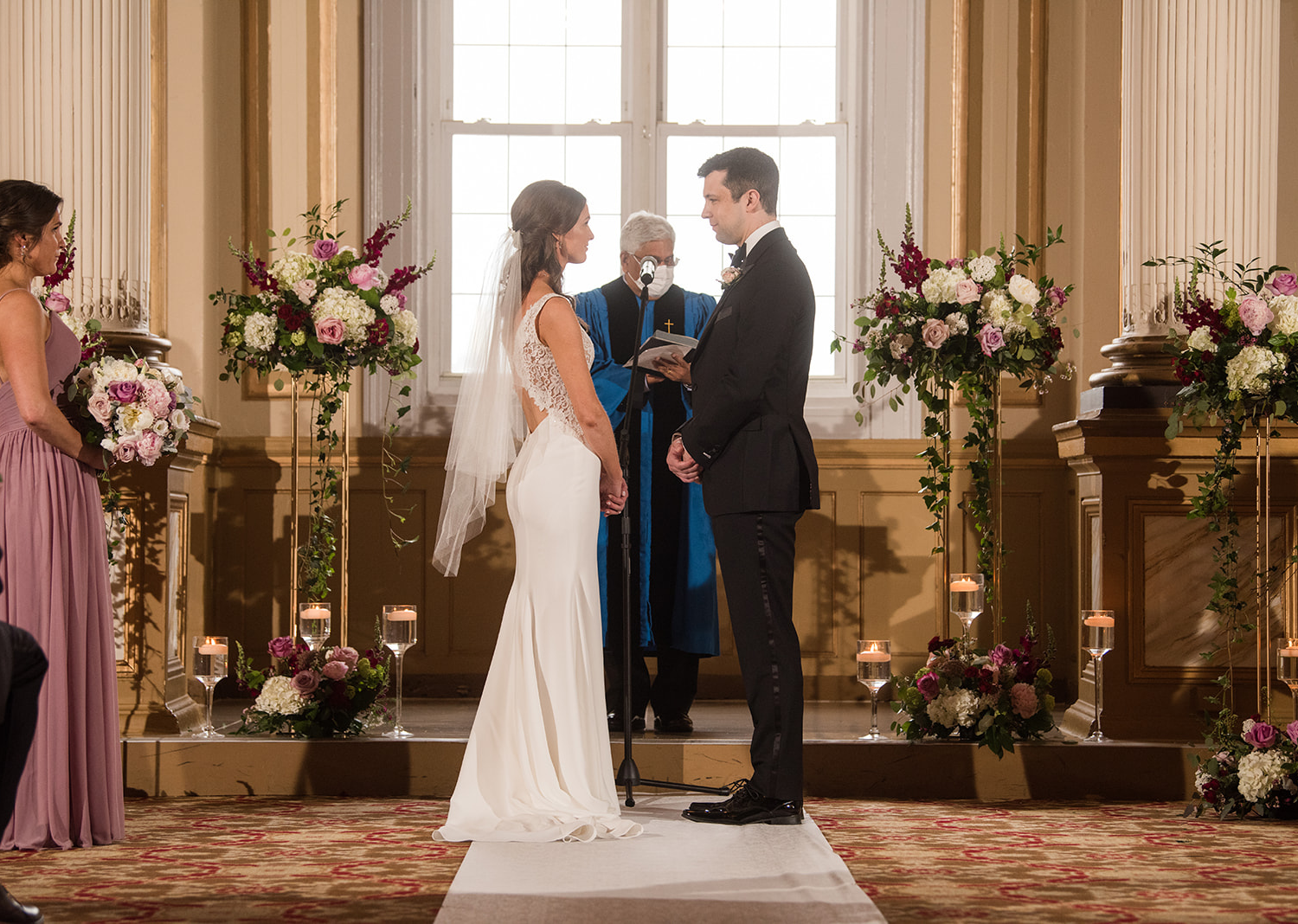 bride and groom during their wedding ceremony at the Belvedere Hotel