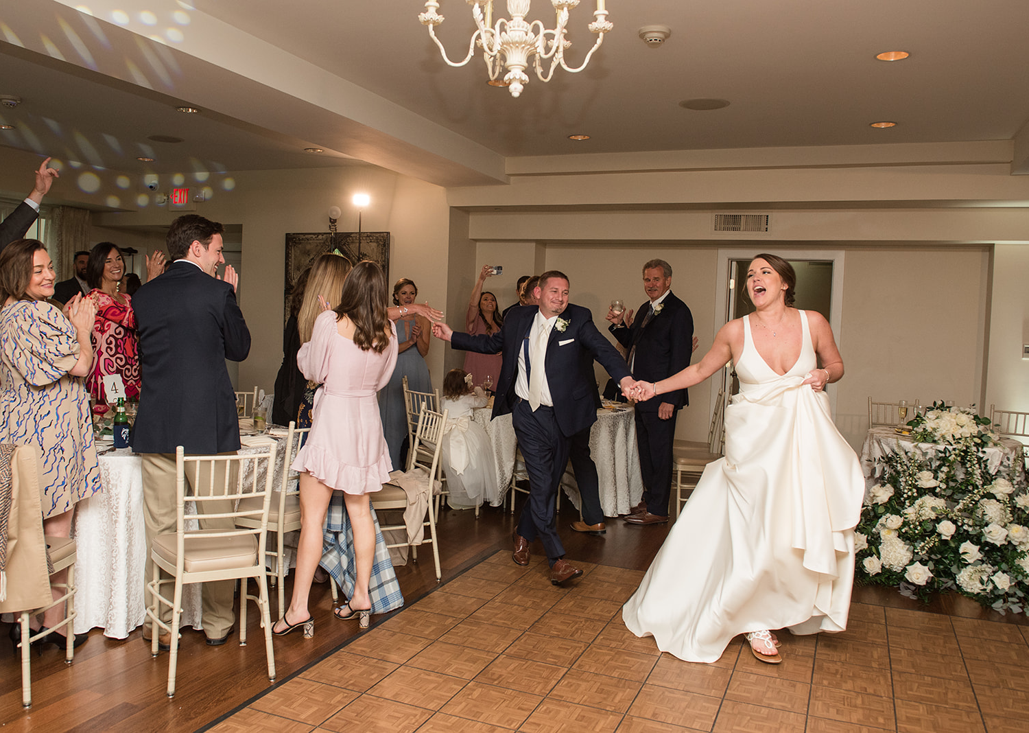 bride and groom make their grand entrance during their wedding reception