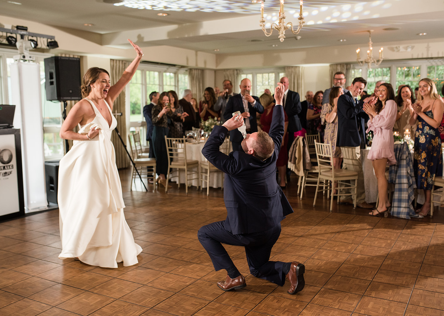 bride and groom having fun as they dance for their first dance