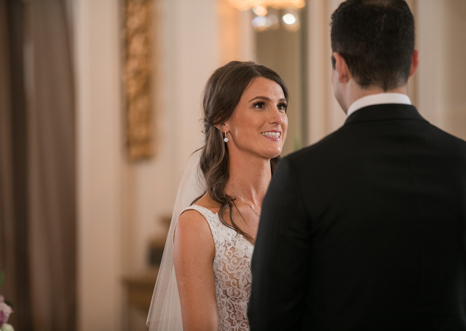 bride and groom during their wedding ceremony at the Belvedere Hotel