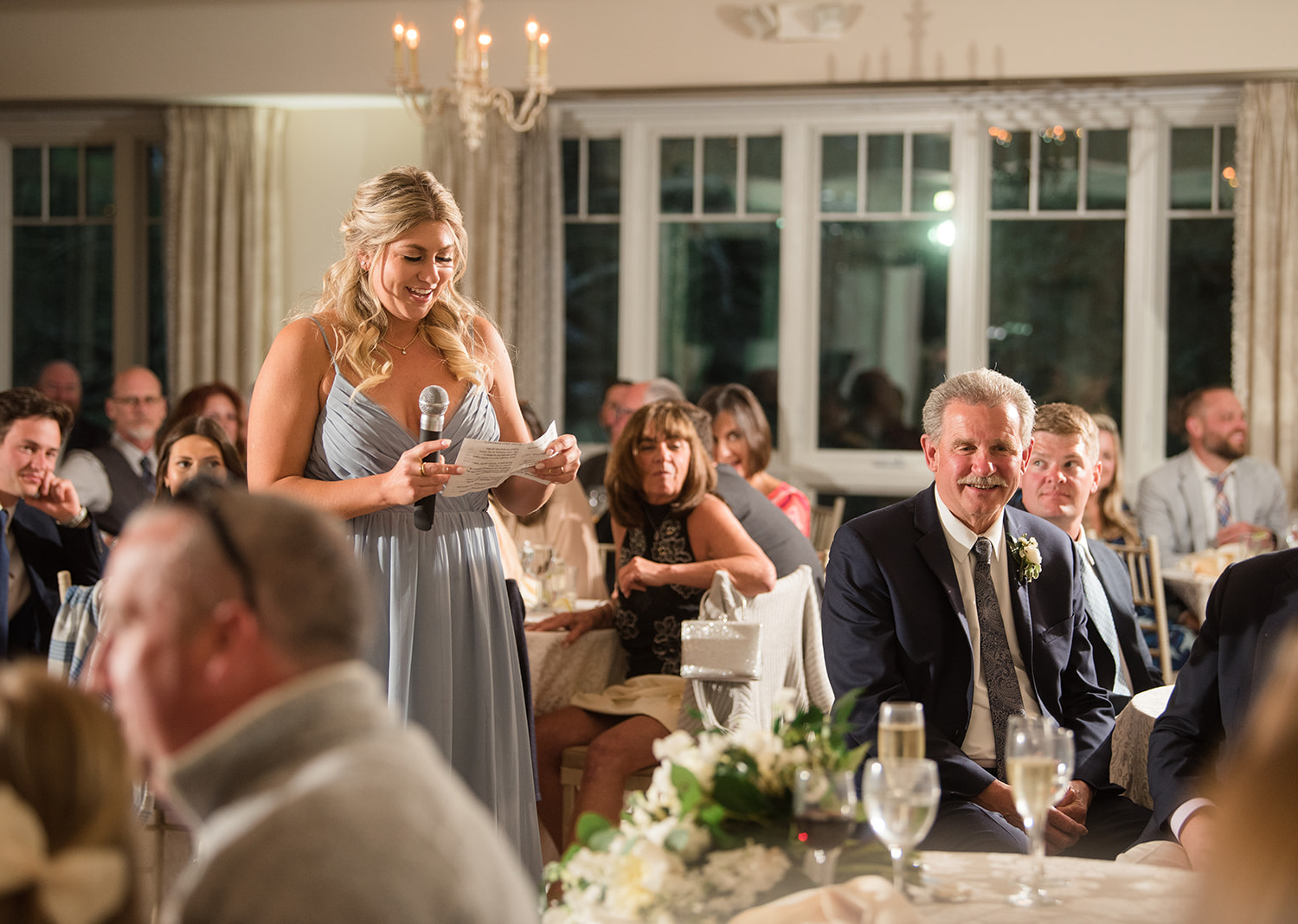 bridesmaid delivering her bridesmaid speech for the bride and groom