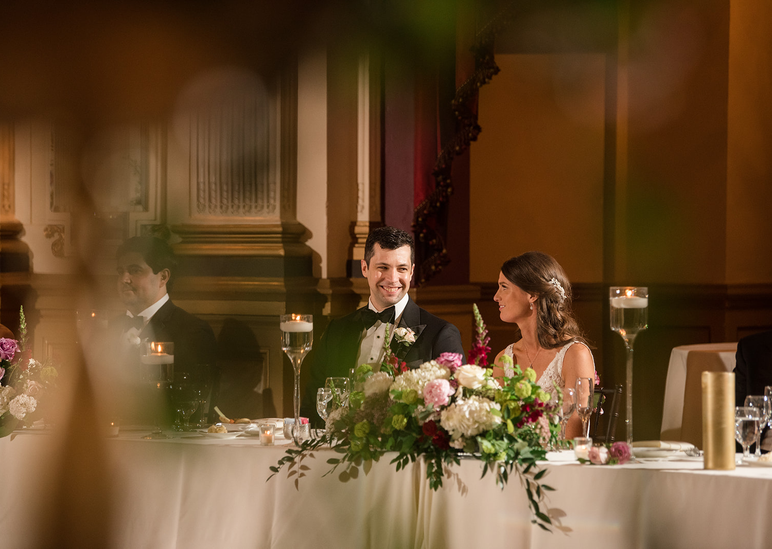 bride and groom at their wedding table during their wedding reception in the Belvedere Hotel