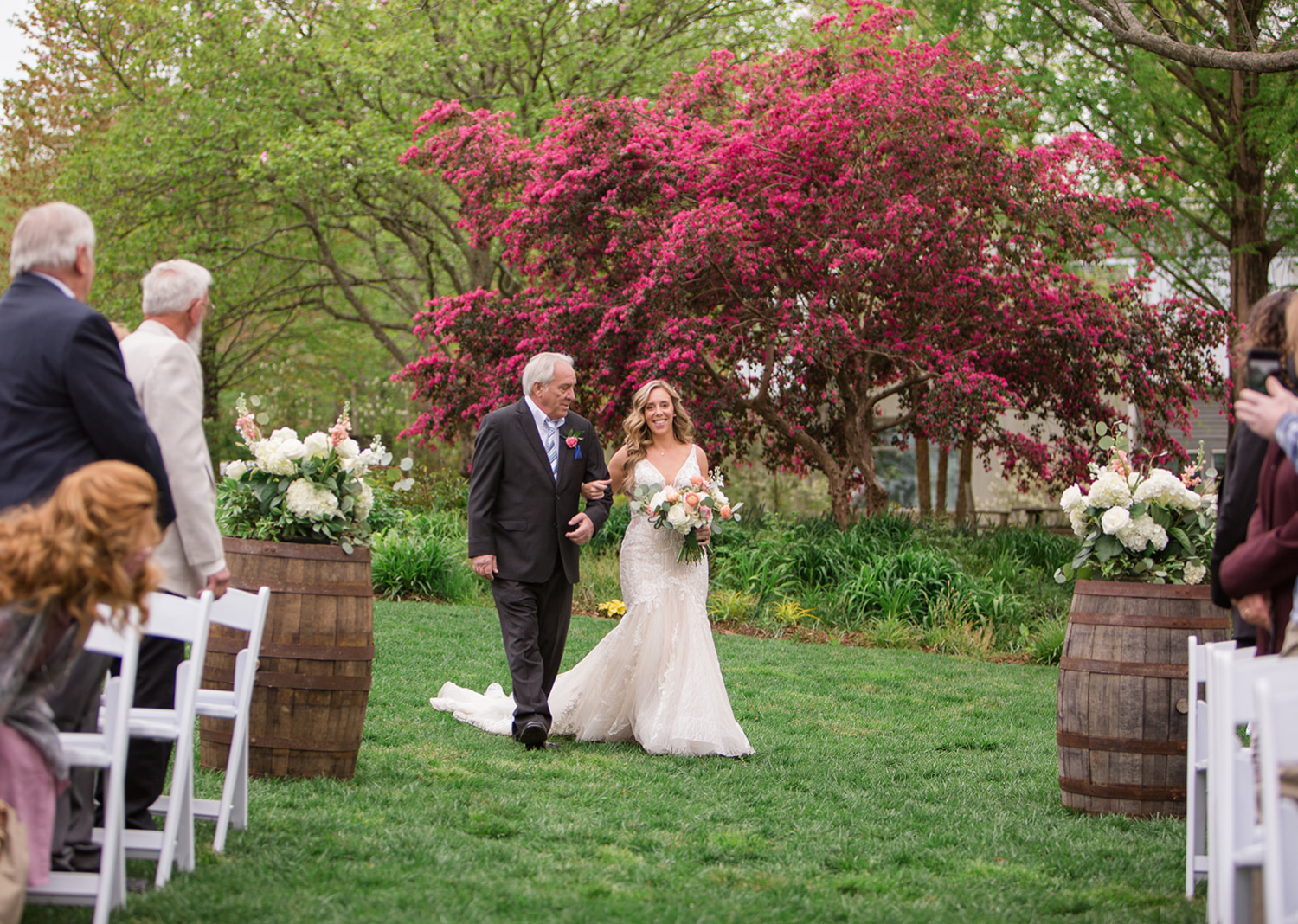 father of the bride walking the bride down the aisle 