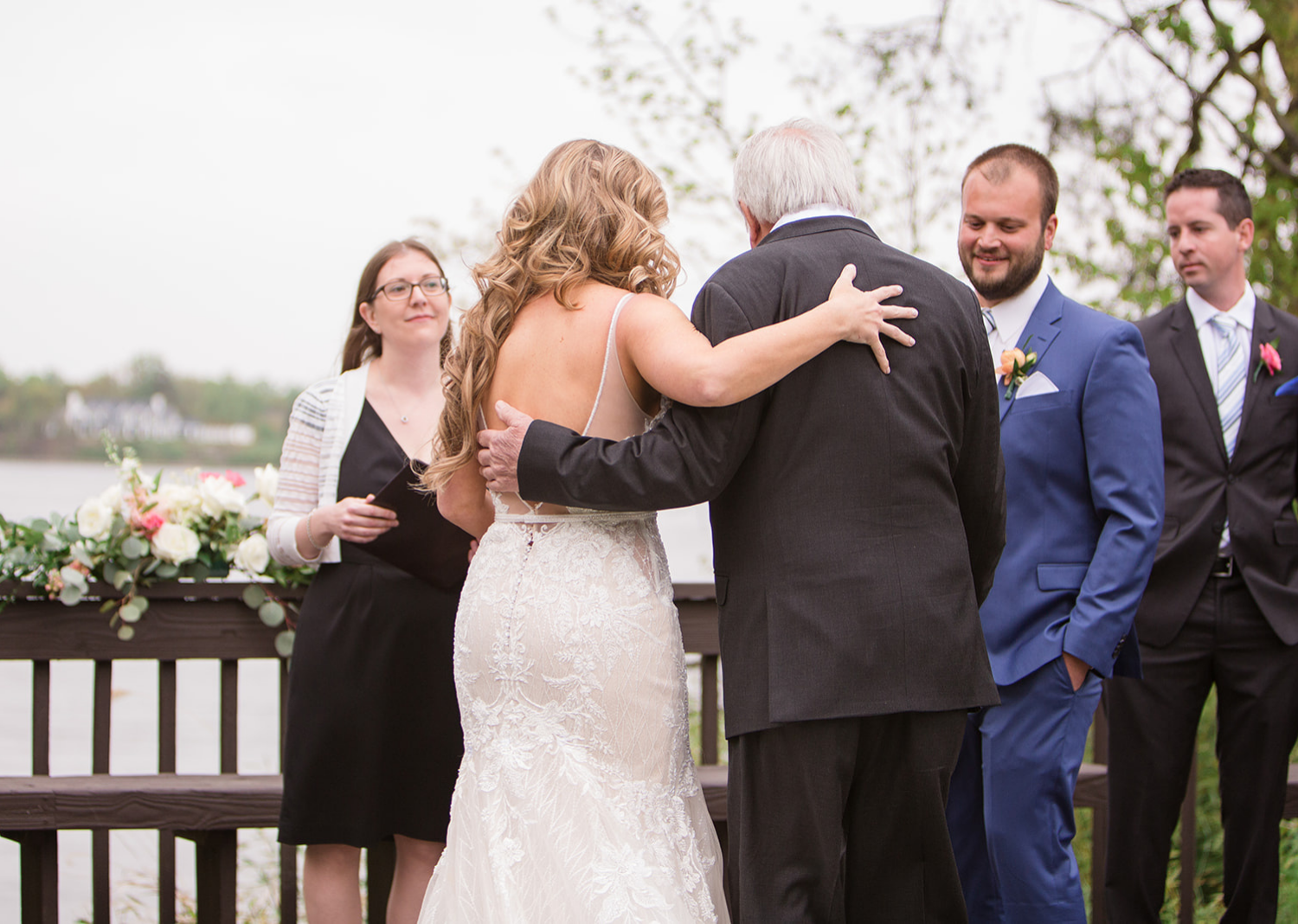 father giving bride away to the groom