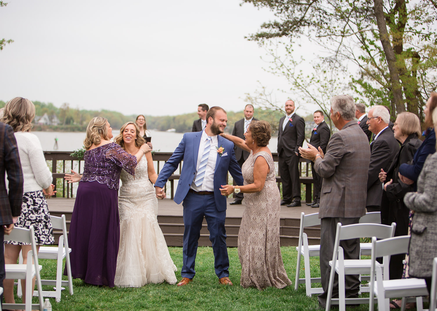 bride and groom walking down the aisle after their wedding ceremony