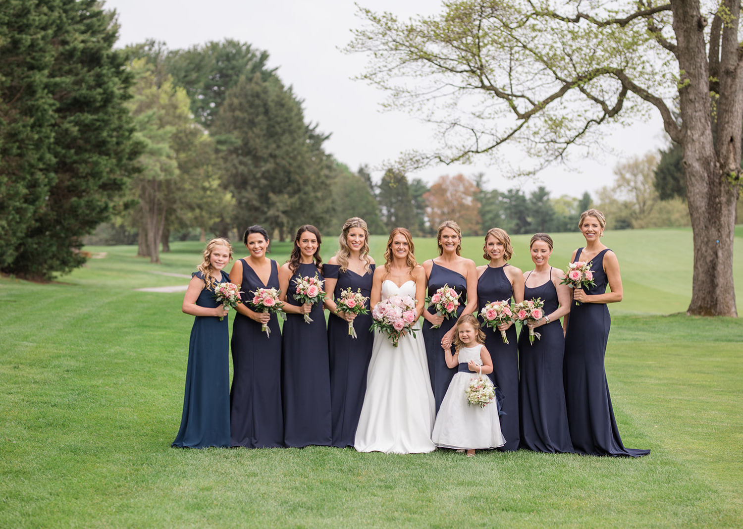 bride with her bridesmaids 