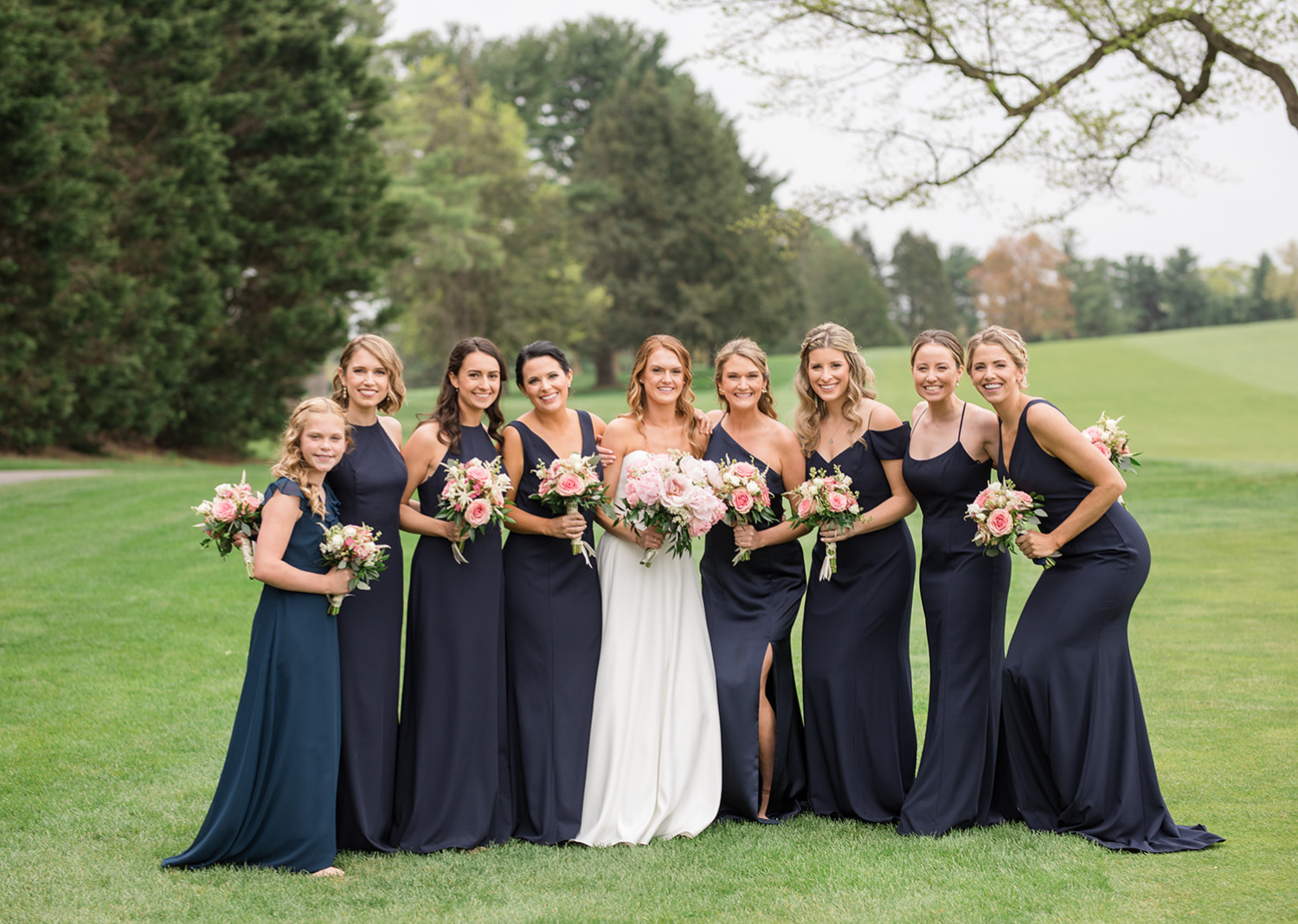 bride with her bridesmaids 