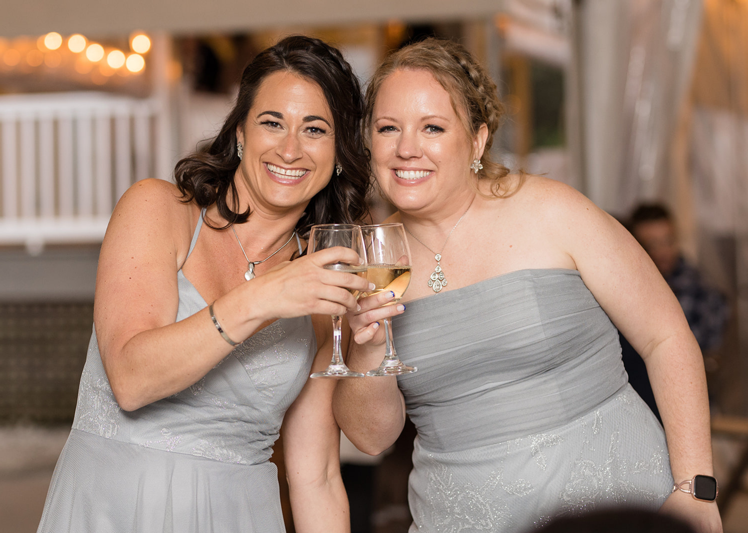 bridesmaids enjoying a drink during the wedding reception