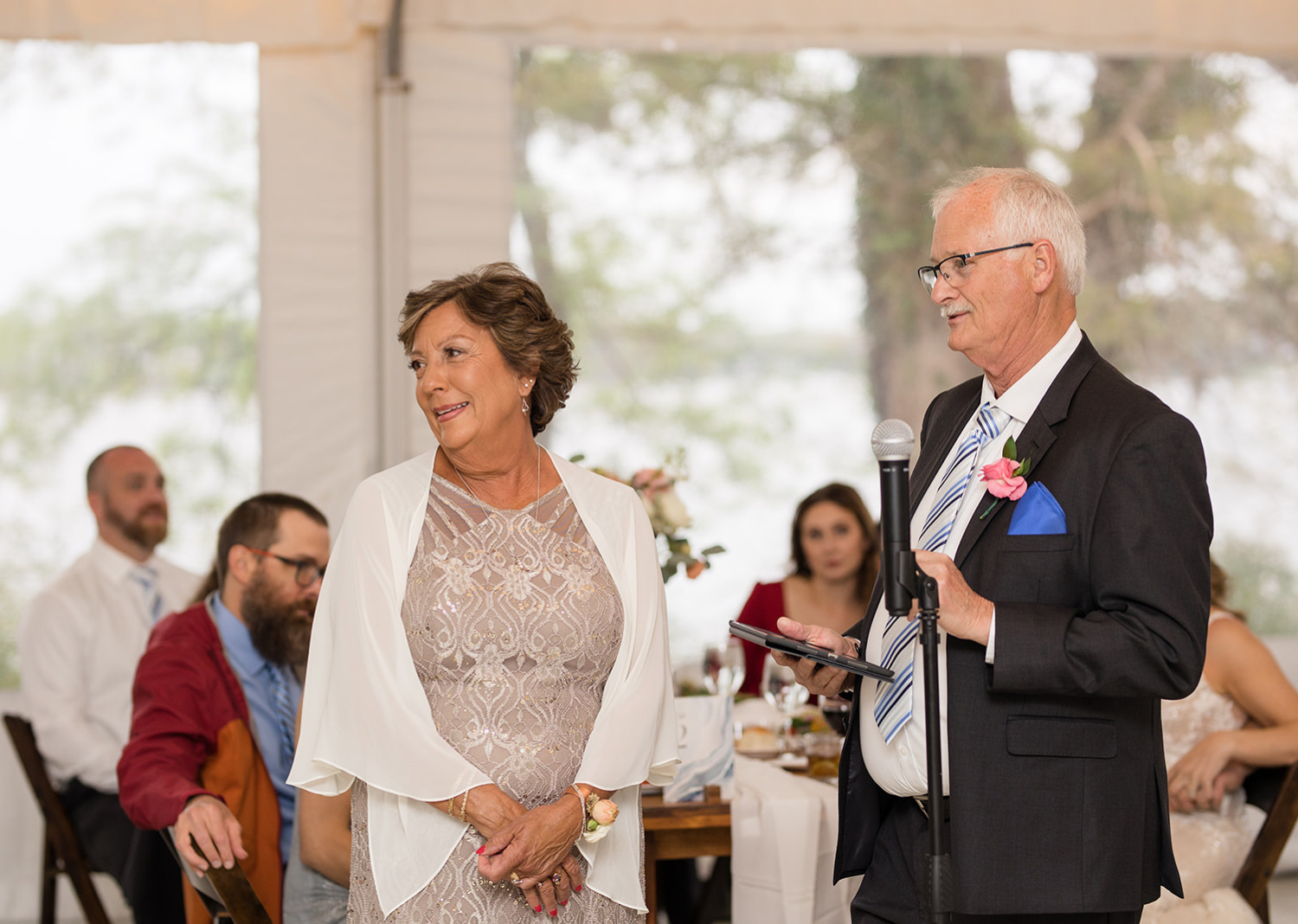 parents of the groom giving a wedding speech