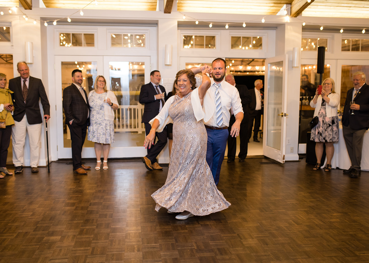 wedding guests dancing at the wedding reception