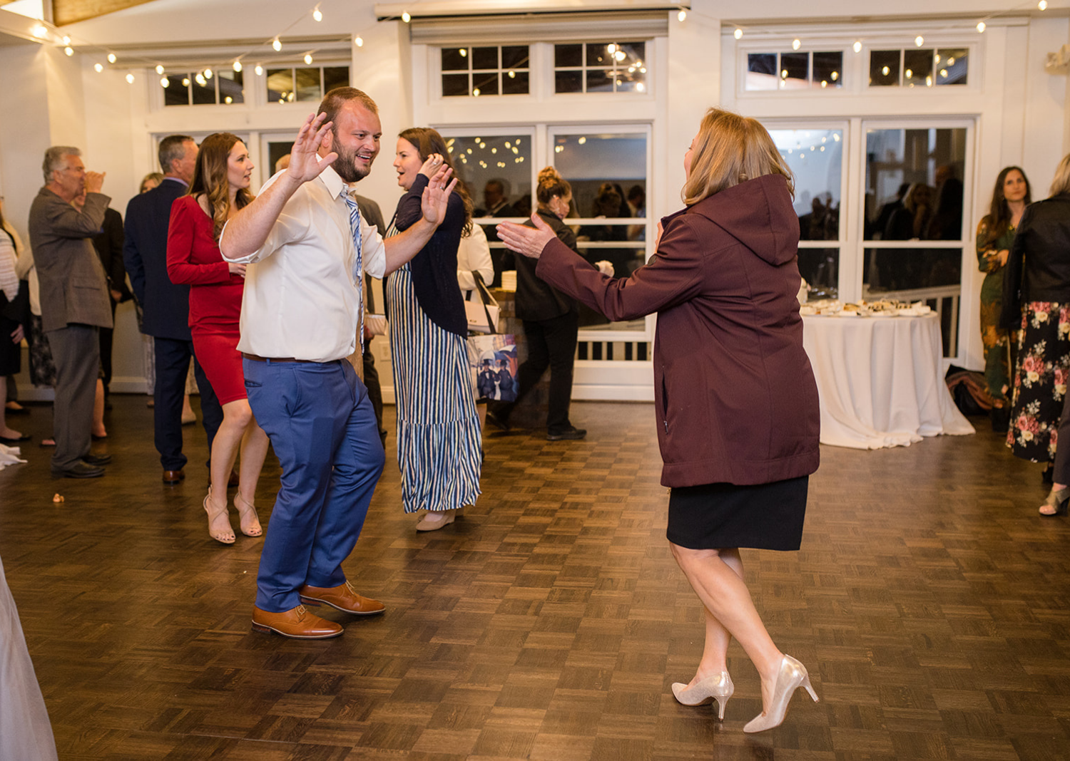 wedding guests dancing during the wedding reception