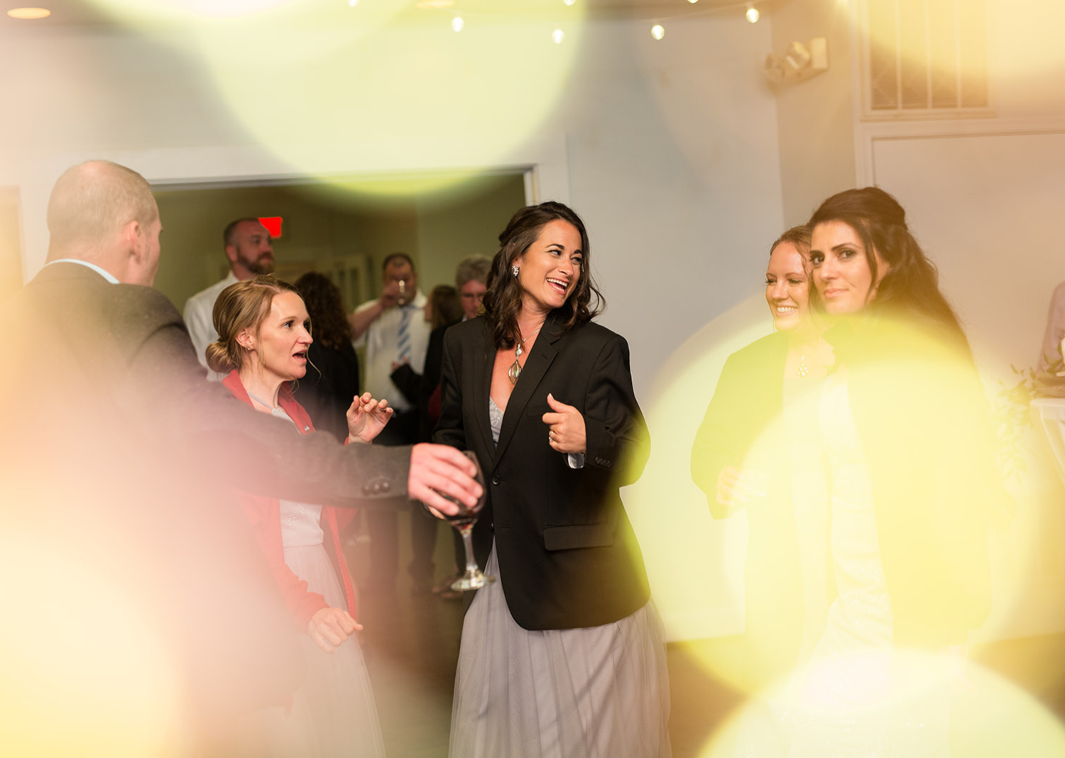 wedding guests dancing during the wedding reception