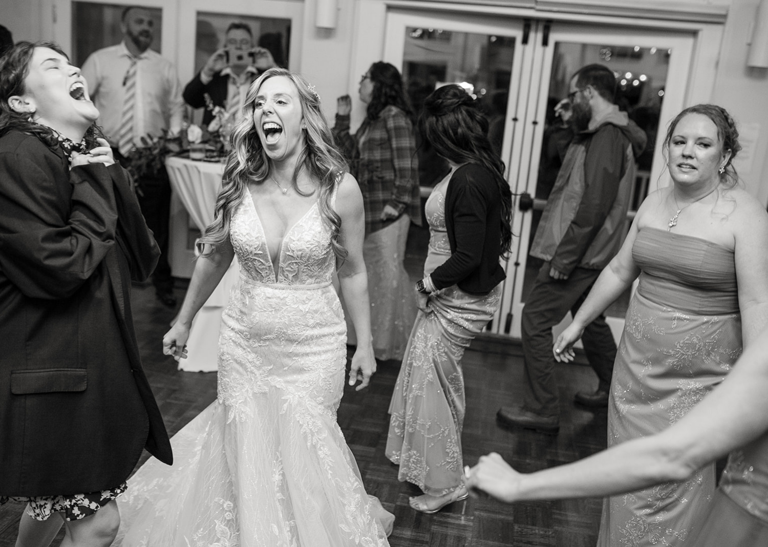 wedding guests dancing during the wedding reception