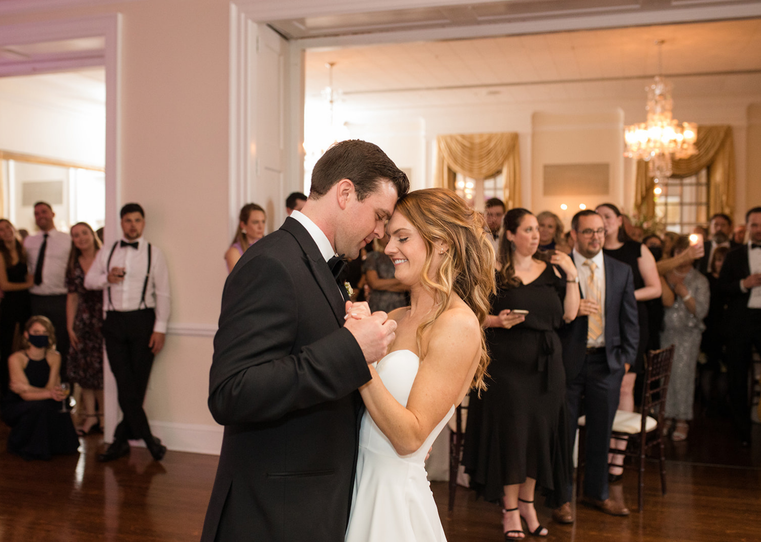 bride and groom share their first dance 