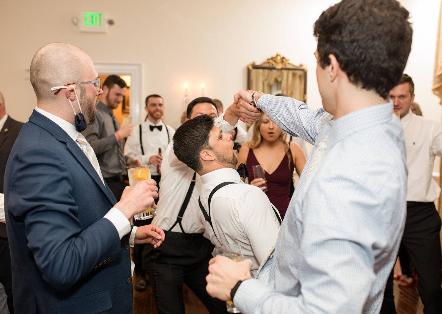 wedding day guests dancing during the wedding reception