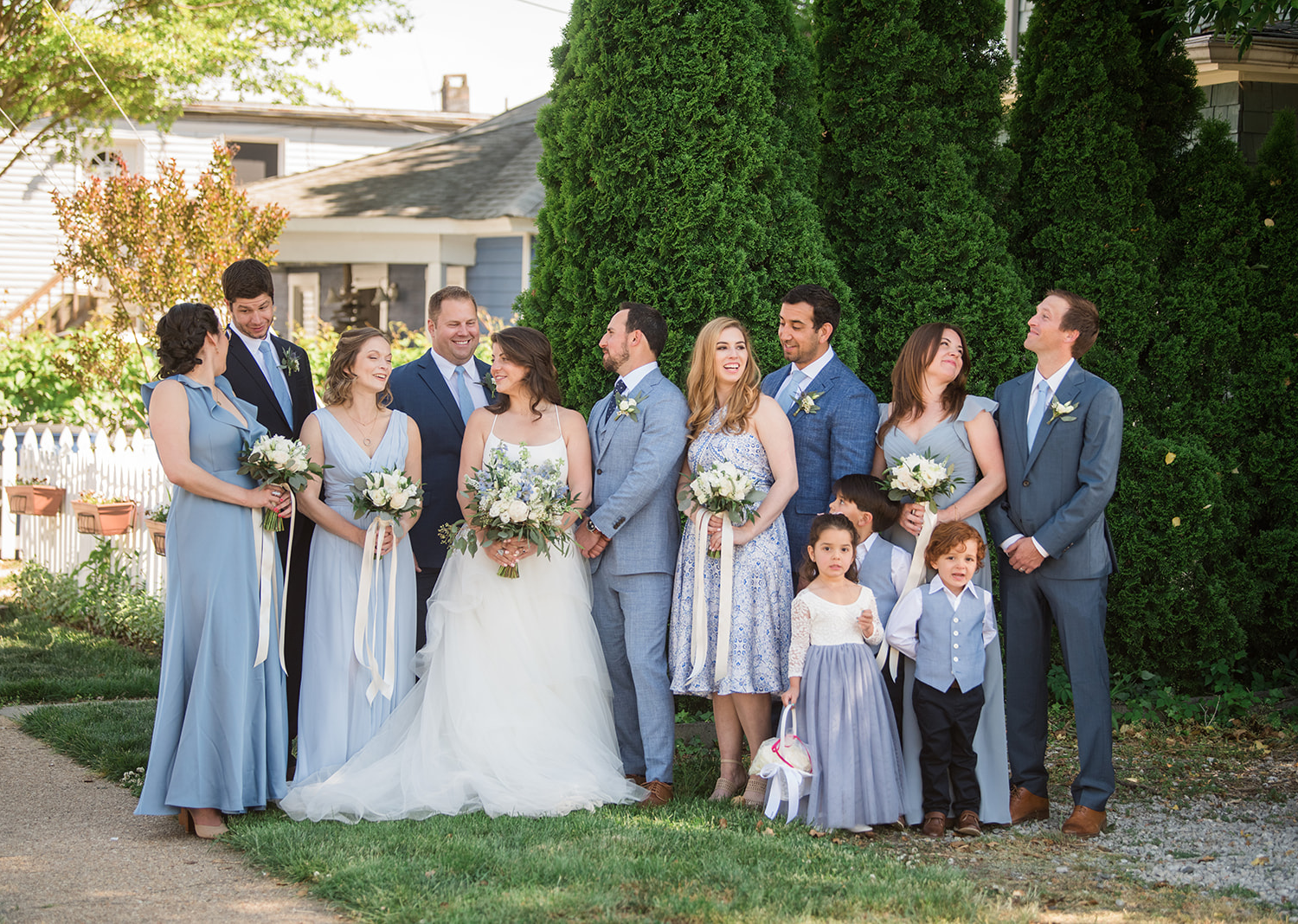 bride and groom with their wedding party