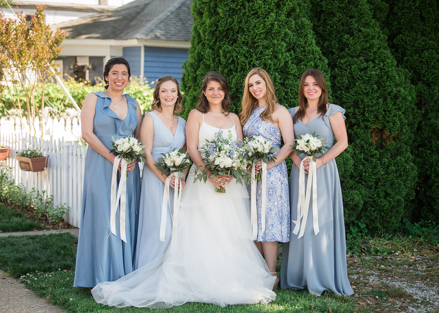 bride with her bridesmaids