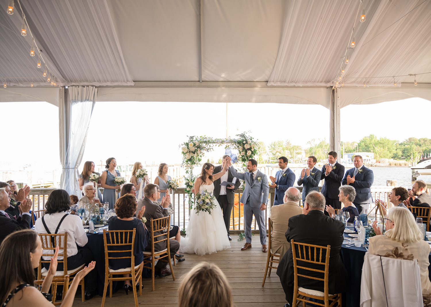 bride and groom celebrate as they are announced husband and wife