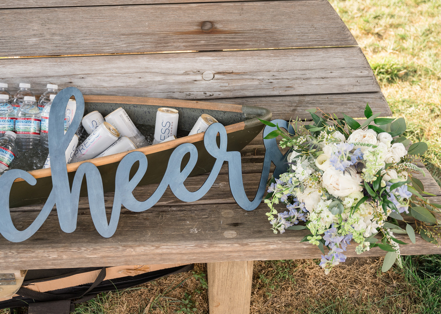 wedding details with a cheer sign around drinks