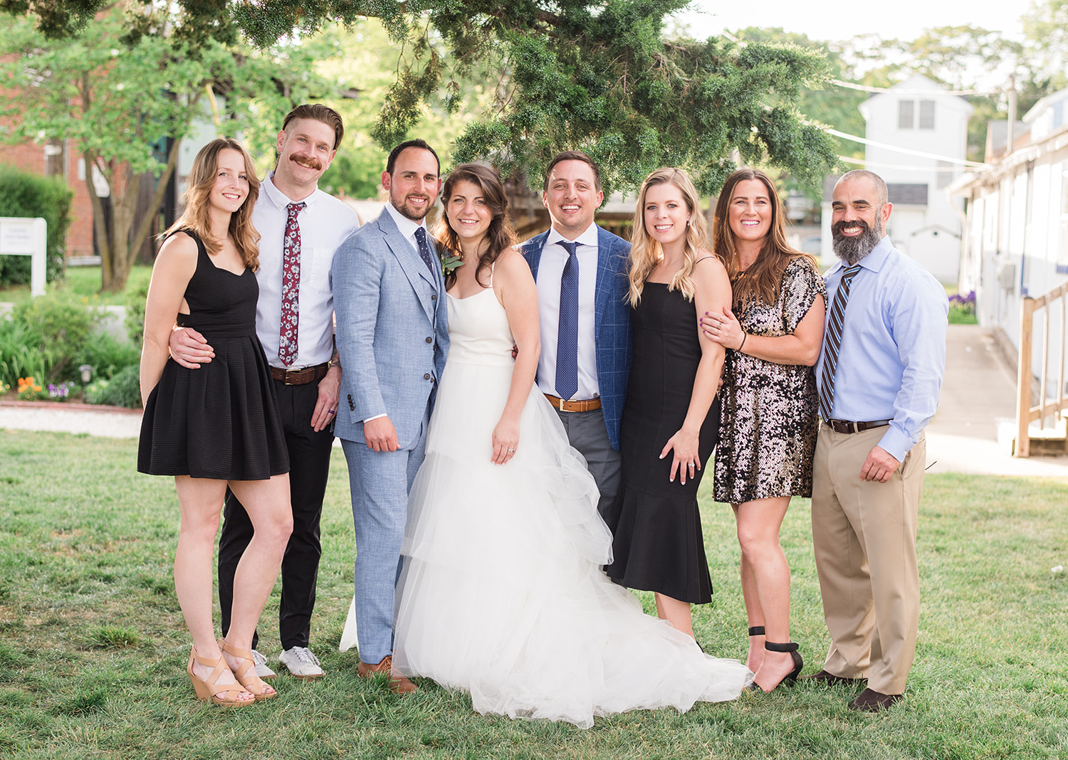 bride and groom with wedding guests