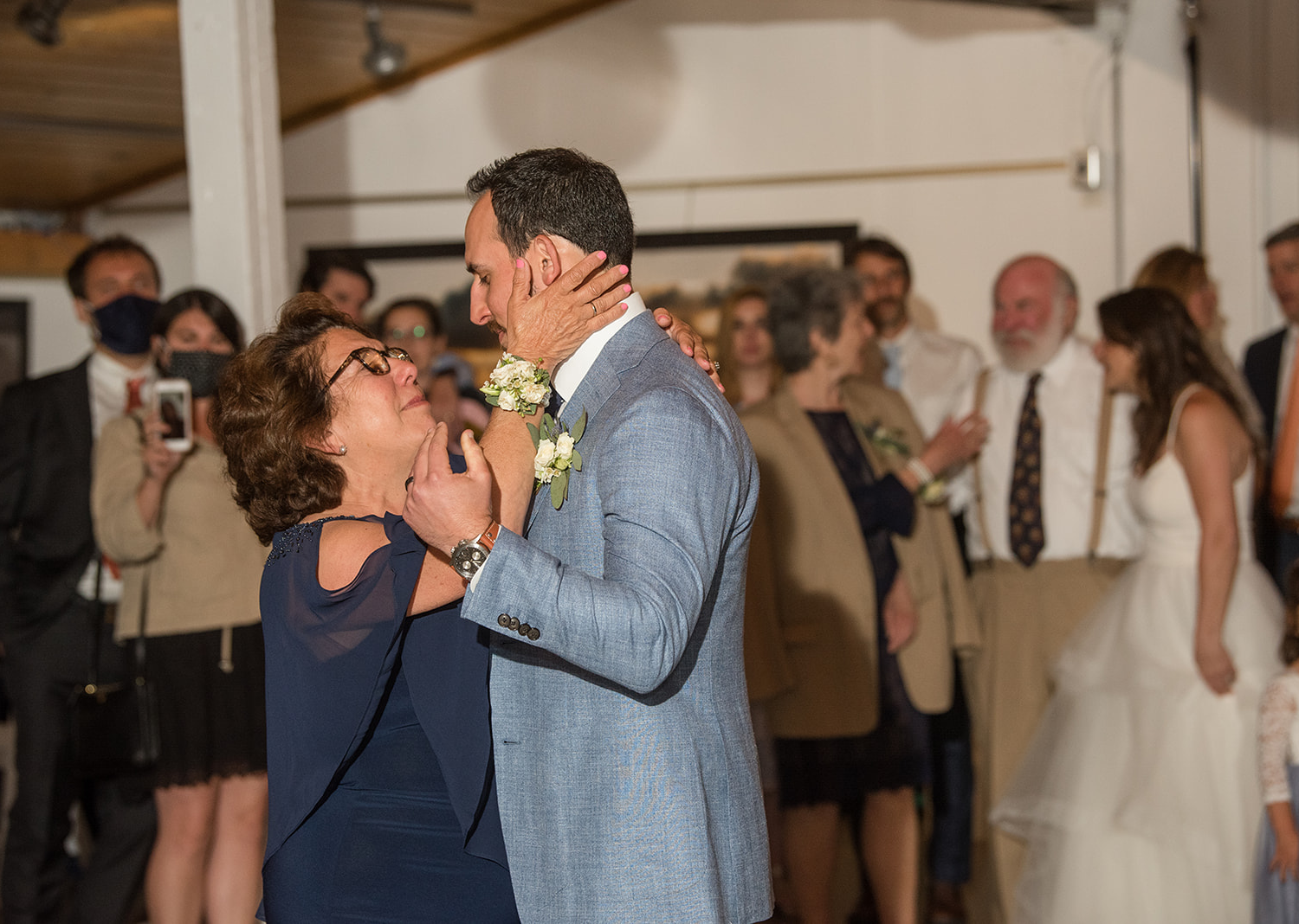 groom shares a dance with his mother 