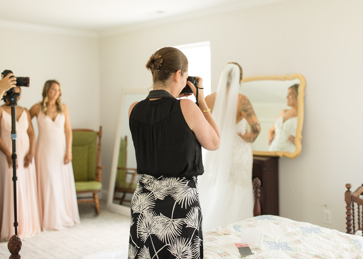 photorapher taking getting ready shots of the bride