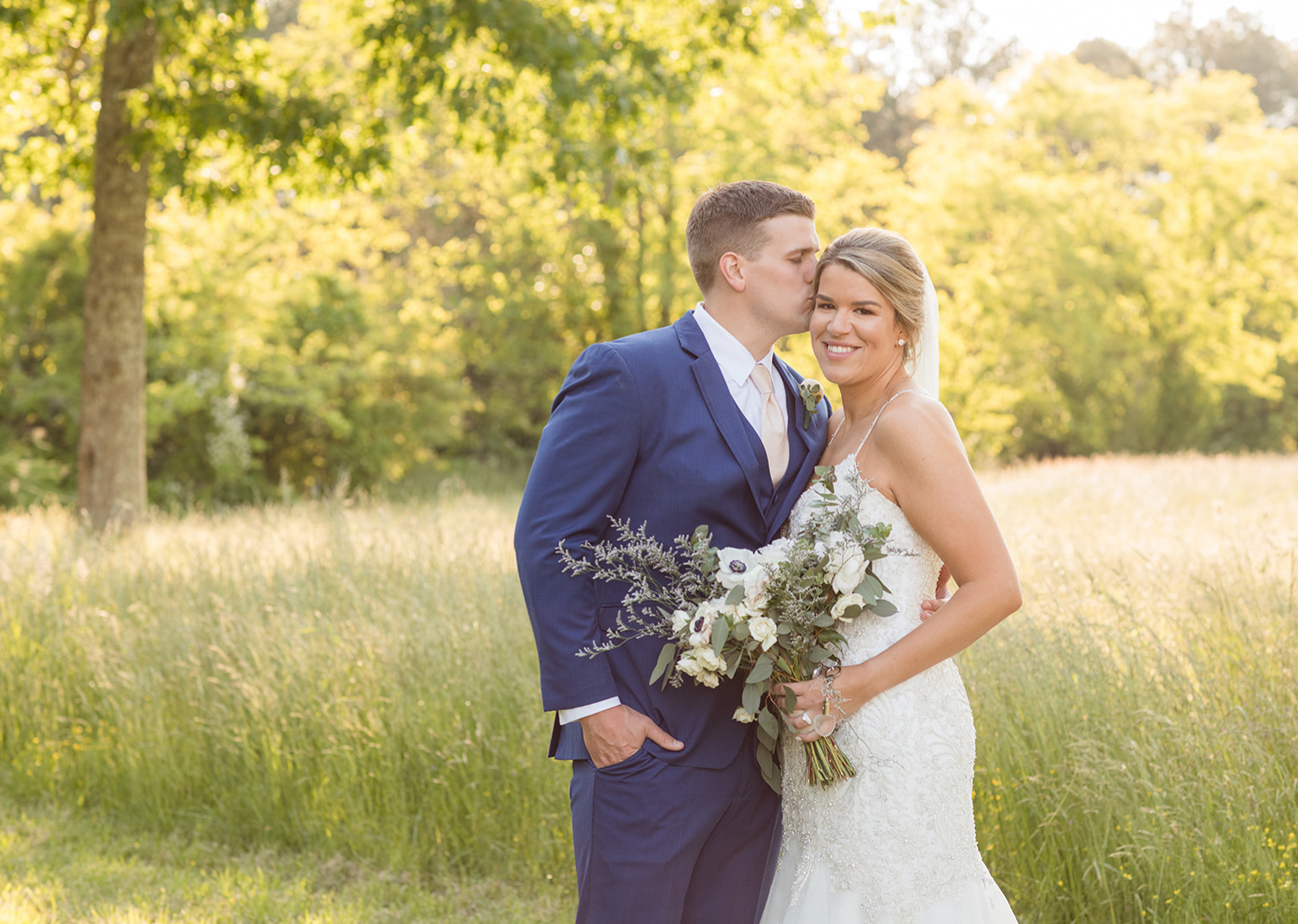 bride and groom outdoor portraits after wedding ceremony